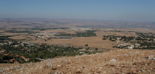 View of Hula Valley with Rosh Pina town and the Galan Heights in the east, Mount Hermom in the north and Lake Kinneret in the south as seen from Mount Canaan slopes, Upper Galilee, Israel.  