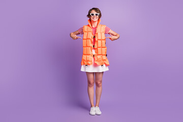 Full length photo of lady direct fingers herself wear vest sunglass striped t-shirt mini skirt sneakers isolated violet color background