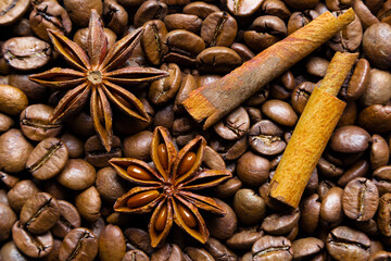 Brown coffee beans cinnamon star anise background texture