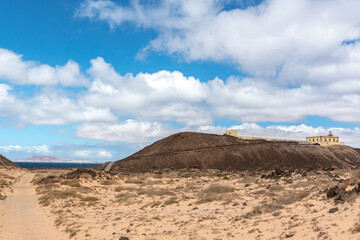 Fototapeta na wymiar Lighthouse on Isla Lobos in Fuerteventura in summer 2020