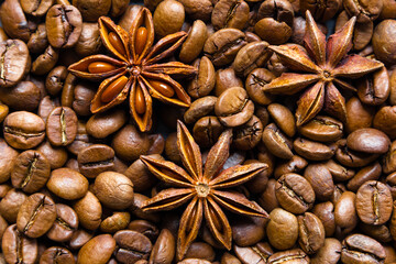 Brown coffee beans and star anise background texture