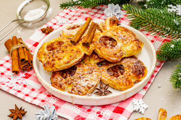 Christmas or New Year sweet apple puffs, fresh homemade bakery