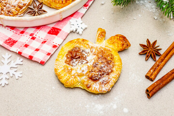 Christmas or New Year sweet apple puffs, fresh homemade bakery