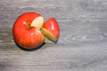 Business market share concept. 25 percent of an apple, part of the whole aplle, quater of the...