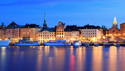 Fototapeta na wymiar Stockholm's Old Town (Gamla Stan) reflected into the lake at dusk, Sweden 