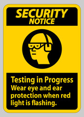 Security Notice Sign Testing In Progress, Wear Eye And Ear Protection When Red Light Is Flashing