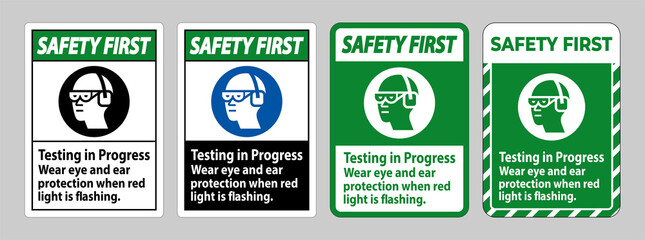 Safety First Sign Testing In Progress, Wear Eye And Ear Protection When Red Light Is Flashing