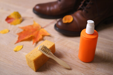 shoe care product brush and sponge on the background of leather shoes