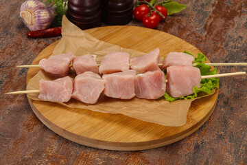 Raw pork meat skewer for grill