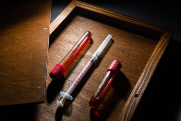 Vaccine ampoule isolated in a box set for injection mixed,Corona virus treatment concept,Covid-19.