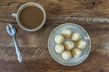 Original dessert with a Cup of hot cocoa. Traditional Tatar dessert talkysh Kalev.