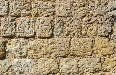 old yellow stone wall background