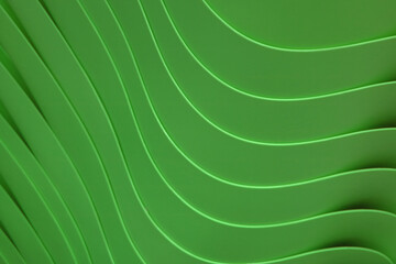 Gorgeous curving lines of the stack of forest green colored acrylic containers for abstract background