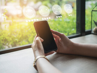 Customer Experience Concept, happy Business women holding the smartphone with a checked box on...