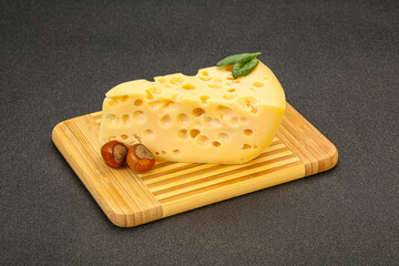 Maasdam cheese - yellow triangle with holes