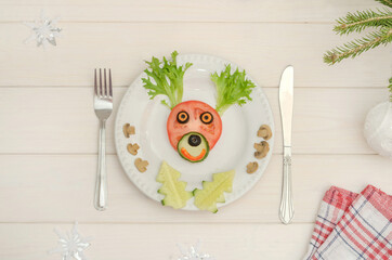 Edible Christmas deer made of vegetables for the festive New Year and Christmas table.