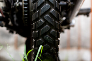 Motorcycle black tire close up with details