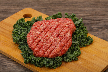 Raw beef burger cutlet for cooking