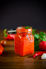 fresh natural homemade sauce made of peppers, tomatoes and other vegetables