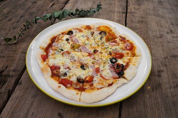 Pizza cheese on a wooden table