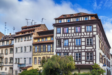 Fototapeta na wymiar Historic houses on the embankment of the Ill river in Petite France district in Strasbourg, France