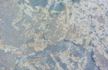 The texture of natural stone is light gray.