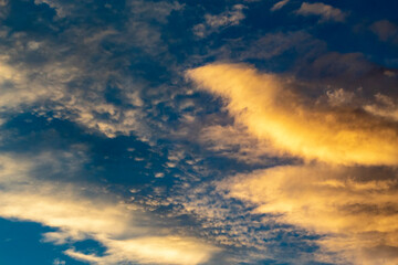 Naklejka na ściany i meble clouds in the sky on a sunny day