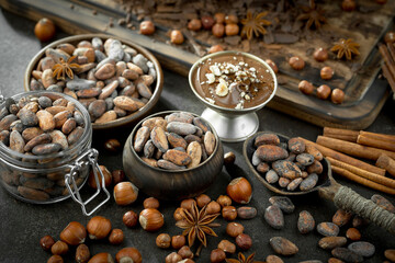Cocoa beans on an old background.