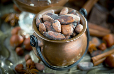 Cocoa beans on an old background.