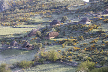 old stone and straw huts called 