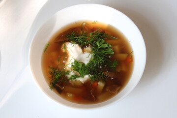 Tasty soup in bowl. Bowl of soup with mushrooms and white cream