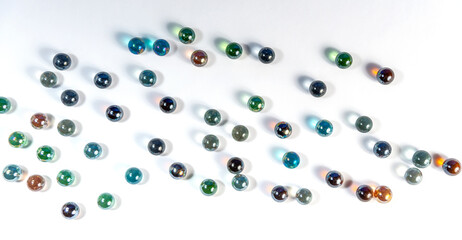 colored glass balls on a white background