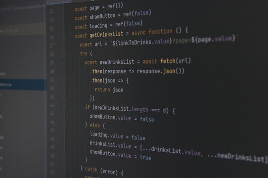 The program javascript code on the computer black screen. The concept of website, internet, cyber security, hacking and software