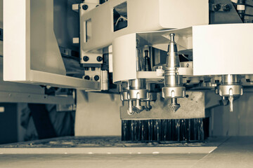 Milling a wooden board. Processing of wood panels on CNC coordinate milling woodworking machines. CNC woodworking machine.