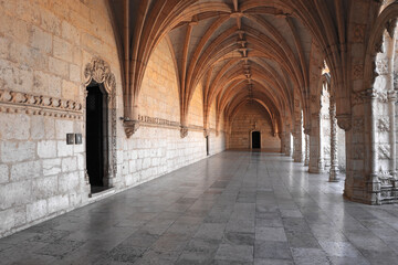 Archway of an old monastery. Cloisters of Jeronimos Monastery. Lisbon Portugal