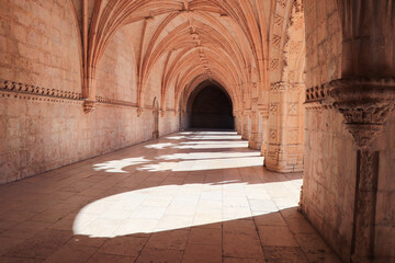 Archway of an old monastery. Cloisters of Jeronimos Monastery. Lisbon Portugal