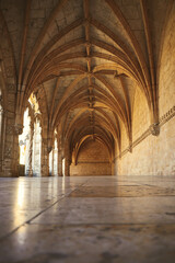 Archway of an old monastery. Cloisters of Jeronimos Monastery. Lisbon Portugal
