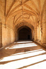 Archway of an old monastery. Cloisters of Jeronimos Monastery. Lisbon Portugal