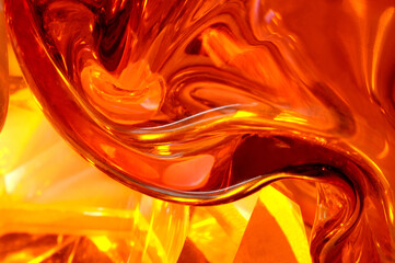 Abstract orange red liquid glass background texture