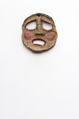 tragic greek theater mask expressing feelings of loss and pain