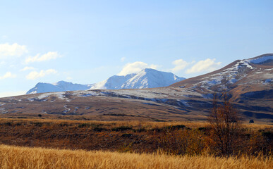 Fototapeta premium Photo of a beautiful autumn landscape with mountains