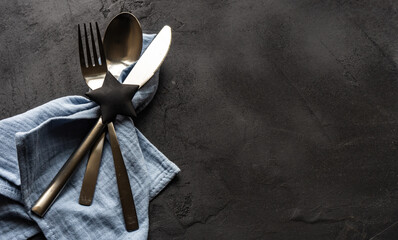 Cutlery set on black background