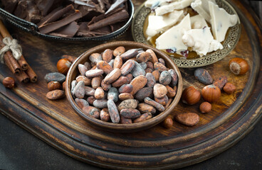 Cocoa beans on old background