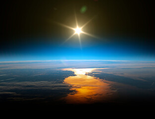 Earth and sun. Elements of this image furnished by NASA.