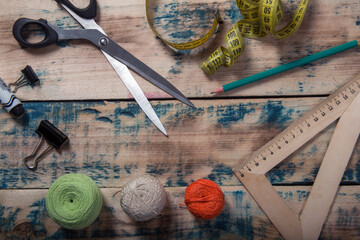 Fototapeta na wymiar Tools for sewing and handmade: thread, scissors,