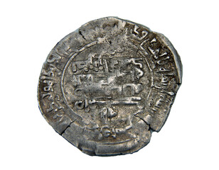 silver ancient arabic coin on white background