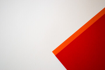 Red and white geometric background with orange line