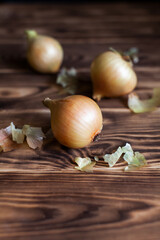 Onions on a wooden table
