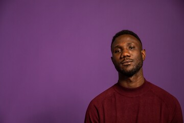 Portrait of Black Man with Black Expression Looking at Camera