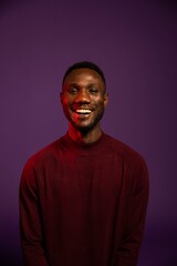 Obraz premium African Man Smiling for Camera on Isolated Background